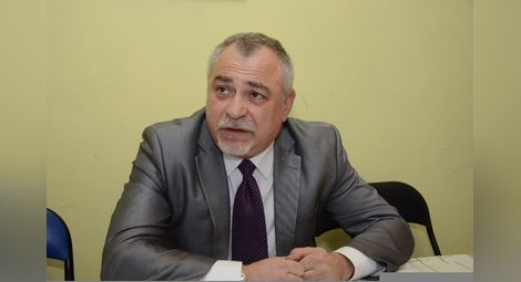 д-р Камен Кожухаров
